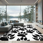 Bold Monochrome Animal Paw Track Rug